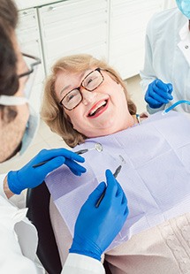 Woman smiling in the dental chair